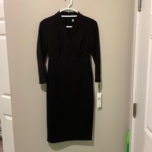 Very classy Little Black Calvin Klein dress. Size 2. Polyester and Spandex.